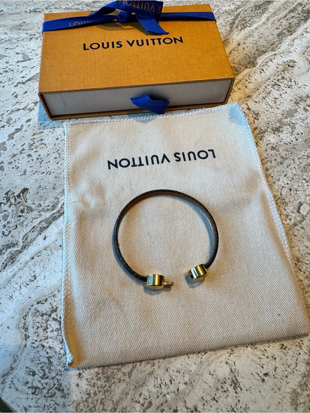 Louis Vuitton Black Leather Cuff with Gold-Tone Caps